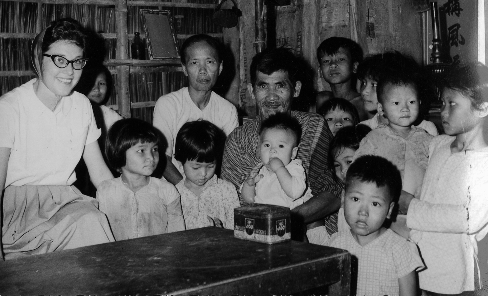 Beverly Keever with a Vietnamese village family